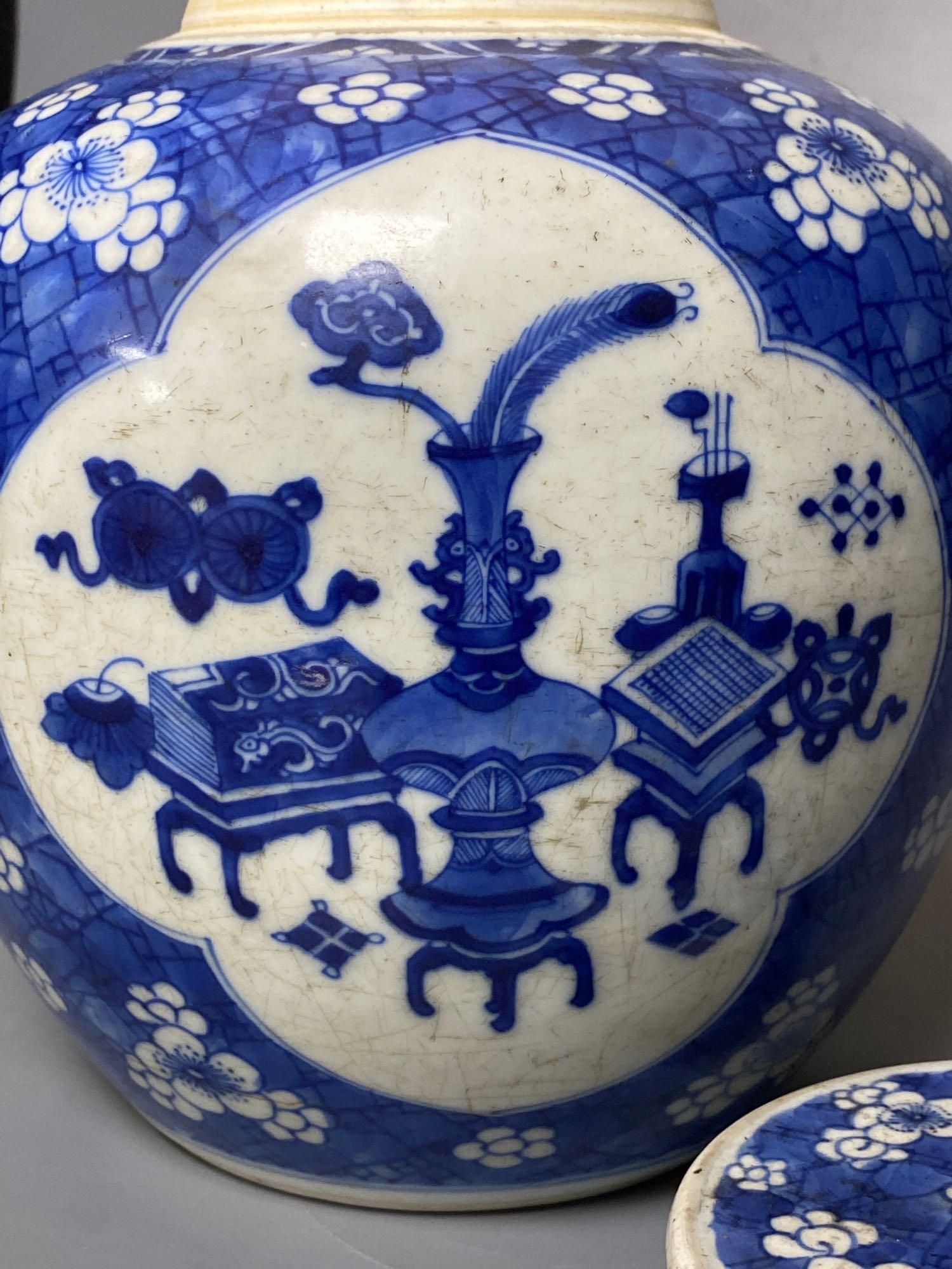 A Chinese blue and white ginger jar and cover, Kangxi period, 22.5cm and two blanc de chine dogs of fo